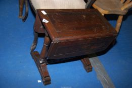 A small drop leaf table.