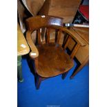 A carved oak Captains chair