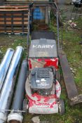 A 'Harry' self-propelled lawn mower with grass box (working at time of lotting).