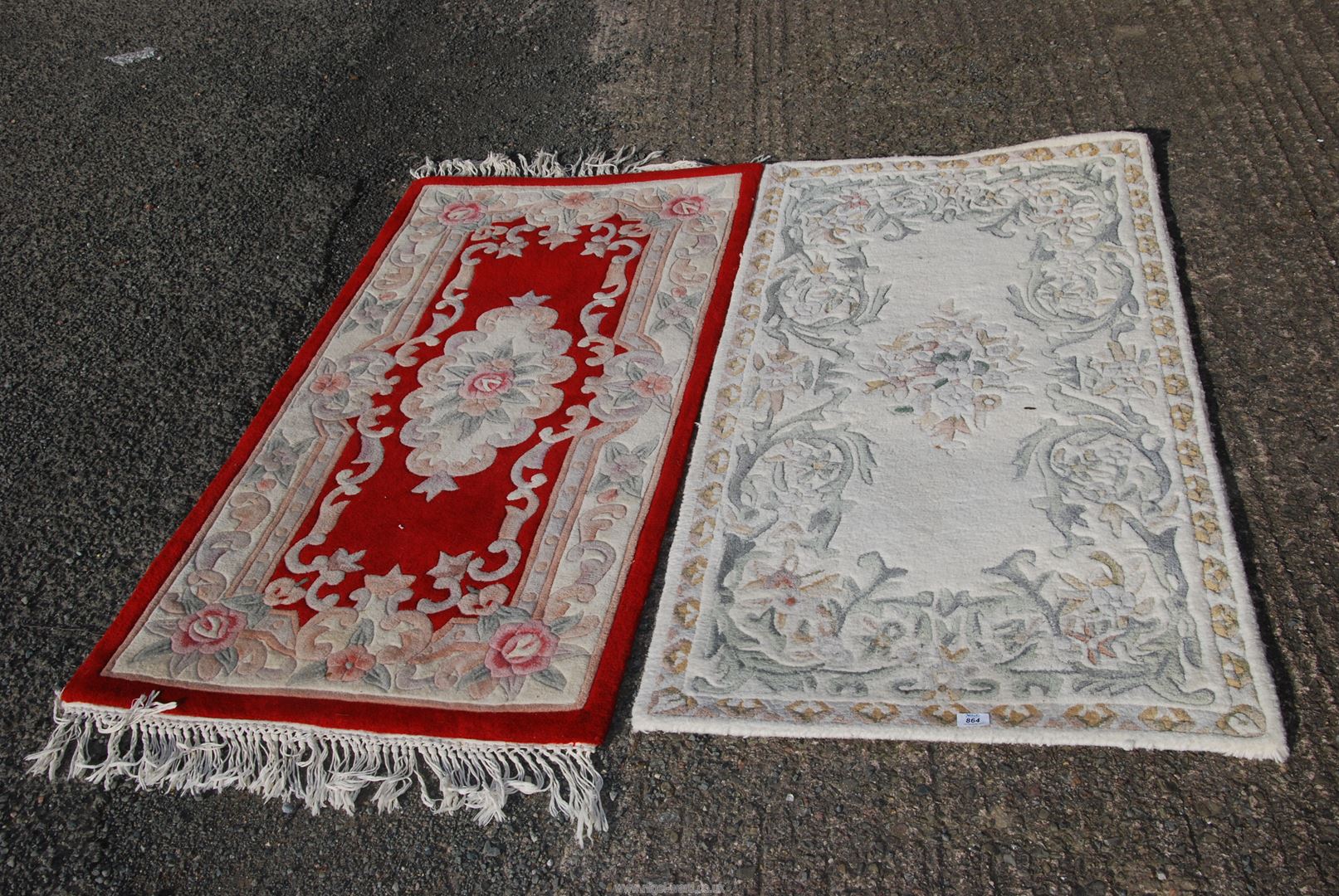 Two rugs - a red rug - 5' x 30", and one made in India 5' x 30½".