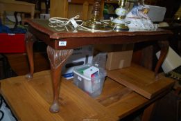 A glass top coffee table - 42" wide x 19" depth x 17" high.