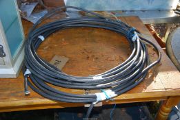 Two rolls of armoured cable.