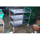 A stainless steel catering three tier trolley.