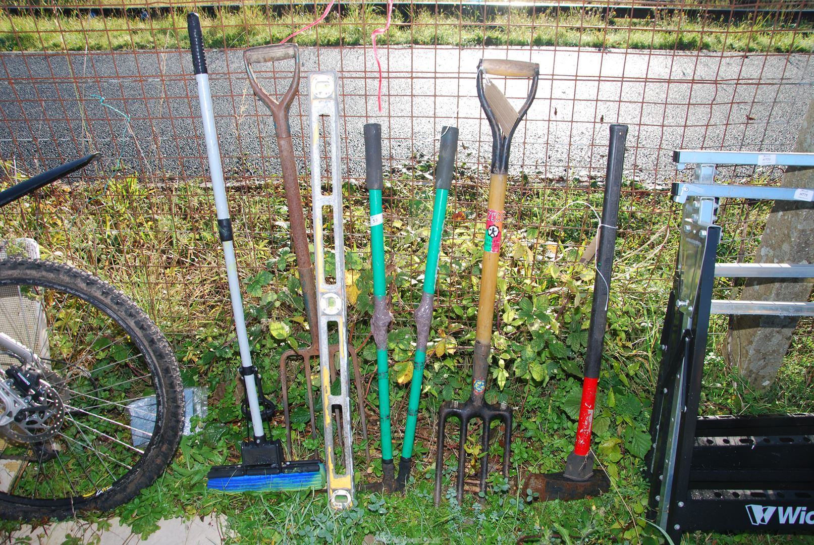 A log-splitter, spirit level and shears, etc.