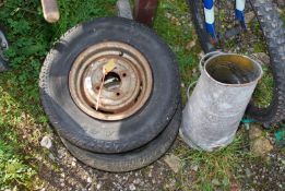 Two Mini wheels and tyres (tyres as seen) and a coal scuttle.