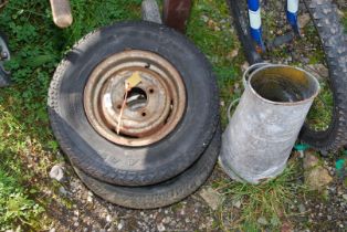 Two Mini wheels and tyres (tyres as seen) and a coal scuttle.