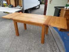 A French medium Oak kitchen/dining table with leaf extensions closed 51" x 29 1/2" x 30 1/2" high