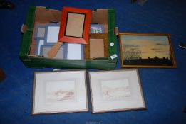 A box of mixed prints, and picture frames.