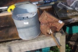 A carpenters bench vice Rededa 9" and a galvanised mop bucket.