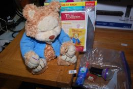 A T.J.Bearytale playskool talking bear and accessories.