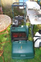 A Balmoral cylinder Lawn Mower model - 17s with a scarifier.