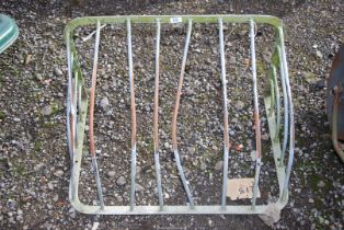 A galvanised wall mounted hay rack.