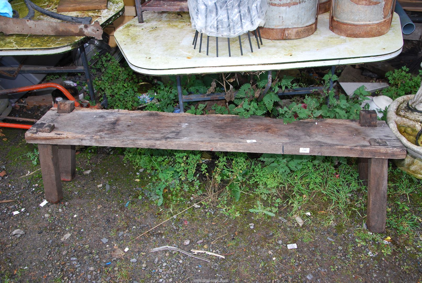 A pig bench - 63" wide x 16" high x 12" depth.