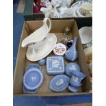 A quantity of Wedgwood blue Jasperware to include bud vases, trinket pots, plated cruet set, etc.