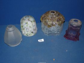 Three Edwardian glass light shades and a Cranberry shade.