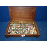 A Collection of minerals in a cabinet, minerals to include; copper cobalt sulphur,