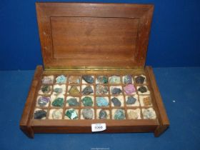 A Collection of minerals in a cabinet, minerals to include; copper cobalt sulphur,