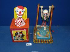 Two Mettoy tinplate toys :Jack-in-the-Box clown, no A.