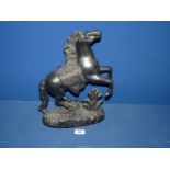 A hollow spelter figure of rearing horse, (reins missing), 15'' tall.