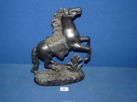 A hollow spelter figure of rearing horse, (reins missing), 15'' tall.