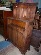 An unusual Oak linen-fold sideboard in the style of a Duodarn,