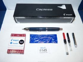 A boxed Pilot capless Fountain Pen in carbonesque blue, with extra refills.