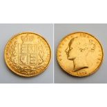 An 1852 Queen Victoria Young Head Shield Back Gold Sovereign coin.