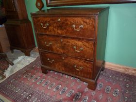 A most appealing Mahogany/Walnut bachelor's Chest having three long drawers with brass swan-neck