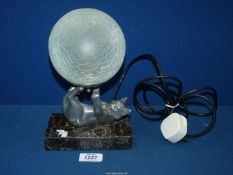 A modern, good quality Art Deco style table lamp, with marble base and cat holding a ball,