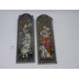 A pair of interesting multicoloured painted continental glass panels of Ladies in the Pre -