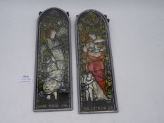 A pair of interesting multicoloured painted continental glass panels of Ladies in the Pre -