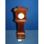 A miniature Grandfather clock by Bryson, Edinburgh, with key, 15" tall.