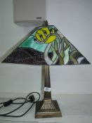 A Tiffany style table lamp, crack to shade, 22'' high approx.