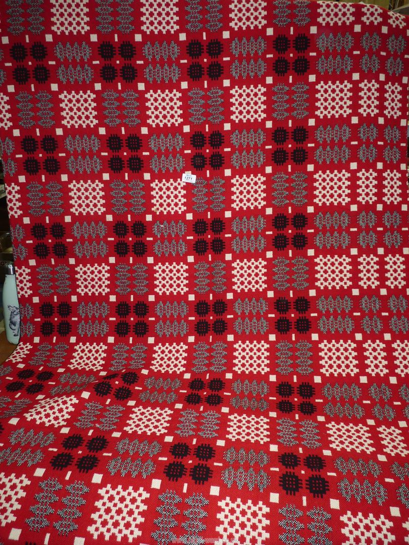 A large red reversible Welsh blanket, 89'' x 75''.