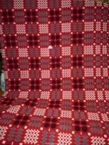 A large red reversible Welsh blanket, 89'' x 75''.