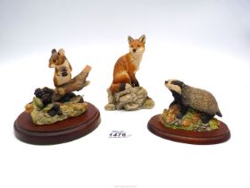 Three Border Fine Arts figures including Wood mouse eating blackberries, Badger and a Fox.
