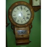 An inlaid Walnut and other woods Wall Clock having a two train spring driven movement (running at