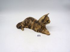 A Winstanley cat in reclining position, signed to base, 11" long x 4 1/2" tall.