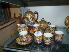 A Japanese part teaset (hairline to one cup).