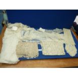 A quantity of old lace including a wedding veil, a/f, shawl, collars, runners etc.