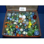 An old tin of Marbles.