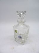 A small Waterford crystal decanter with stopper, 8" tall.