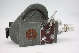 A Cased Pathé Webo 16mm Ciné Camera having Som Berthiot Lens set and in fitted case.