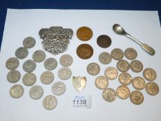 A quantity of shilling coins and old 5 pence coins, half a buckle and silver initialled plaque.