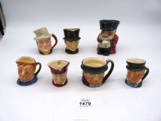 A small quantity of miniature character jugs including Royal Doulton 'John peal', 'Cardinal' (a/f),