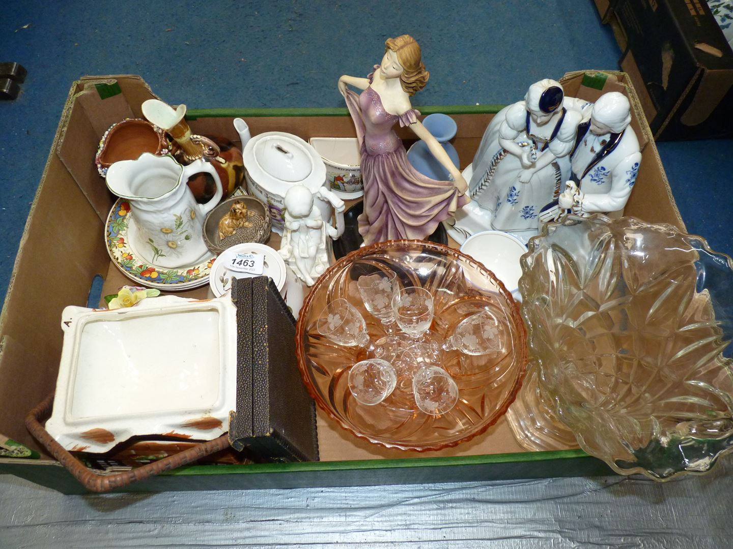 A quantity of china to include; Wade dog basket ashtray, brown floral jug,
