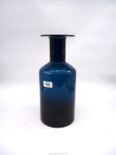 A large vintage Holmegaard style Gulvase in sky blue, having some minor age related marks,