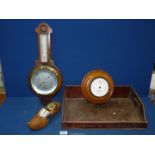 A 'Negretti & Zambra' barometer London on a carved oak base, wall hanging,