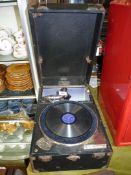 An antique Decca Salon record player in black case, pat nos. 5650/23 33346/28.