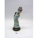 A Lladro Geisha figure 1978.